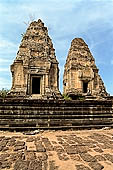 Angkor - Eastern Mebon - towers of the  central platform representing the peaks of Mount Meru